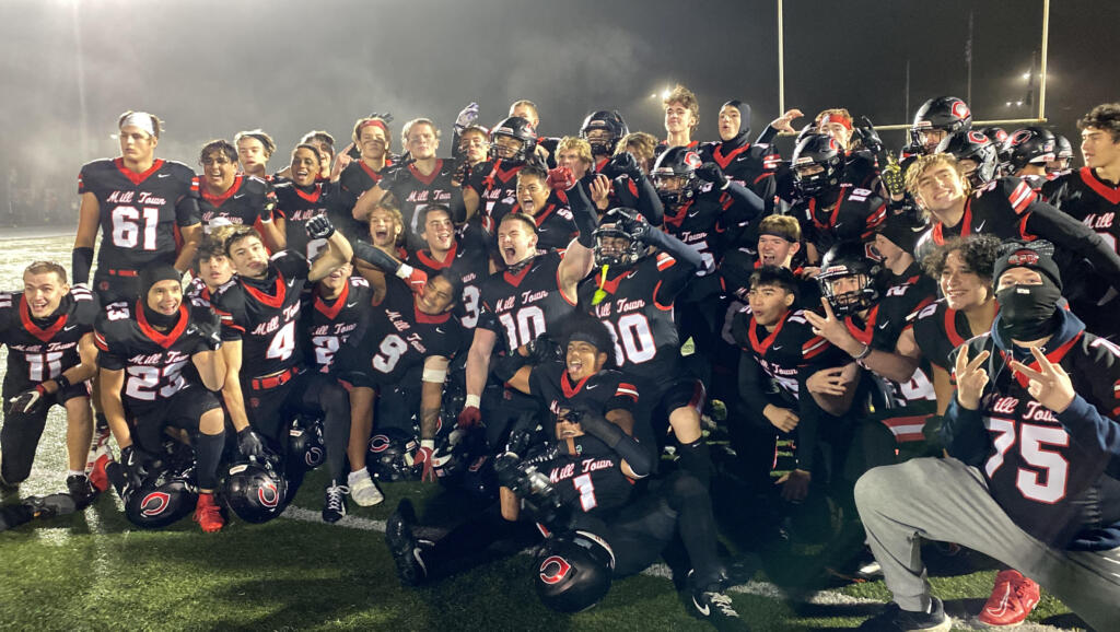 The Camas Papermakers celebrate their 41-6 win over Curtis of University Place to open the Class 4A state playoffs. Camas scored 32 unanswered second-half points after leading 9-6 at halftime.