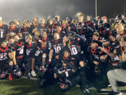 The Camas Papermakers celebrate their 41-6 win over Curtis of University Place to open the Class 4A state playoffs. Camas scored 32 unanswered second-half points after leading 9-6 at halftime.