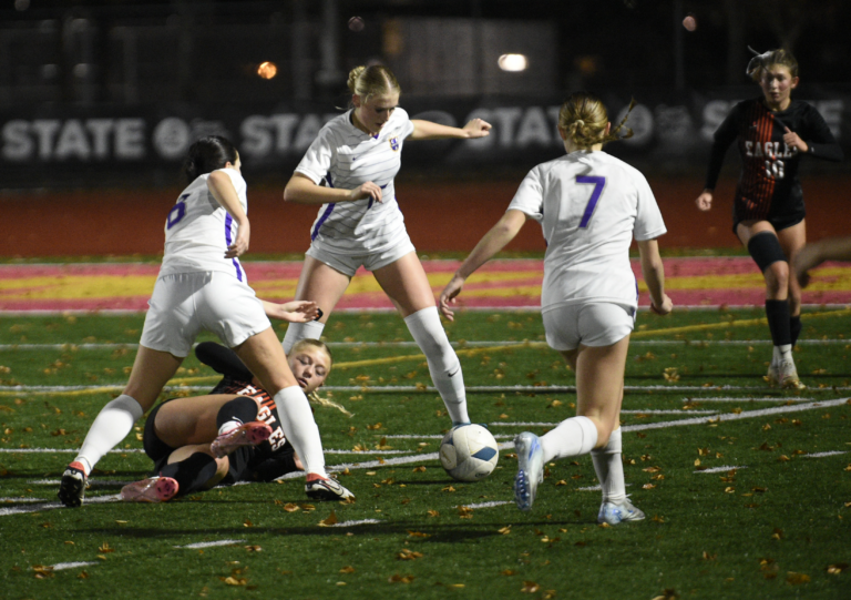 Columbia River's Maya Delgadillo (from left), Makayla Hundt and Remi Buckley stop a West Valley attack during the first half in the Class 2A girls soccer state semifinal game at Mount Tahoma Stadium on Friday, Nov. 22, 2024.