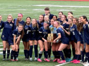 The Seton Catholic girls soccer team after winning the 1A District 4 title 1-0 over Montesano on Saturday, Nov. 9, 2024, at King's Way Christian High School.