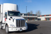 An 18-wheeler sits at Rose Way Industrial Park in Woodland.