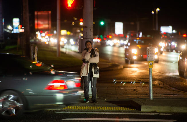 Christie Deford of Vancouver waits for the light to change so that she can cross the intersection at Fourth Plain Boulevard and 117th Avenue, a journey she makes at least twice a day going to and from work. The area has been a hot spot for cars striking pedestrians and officials warn to practice good road safety.