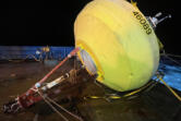 Buoy 46089 sideways aboard a ship.