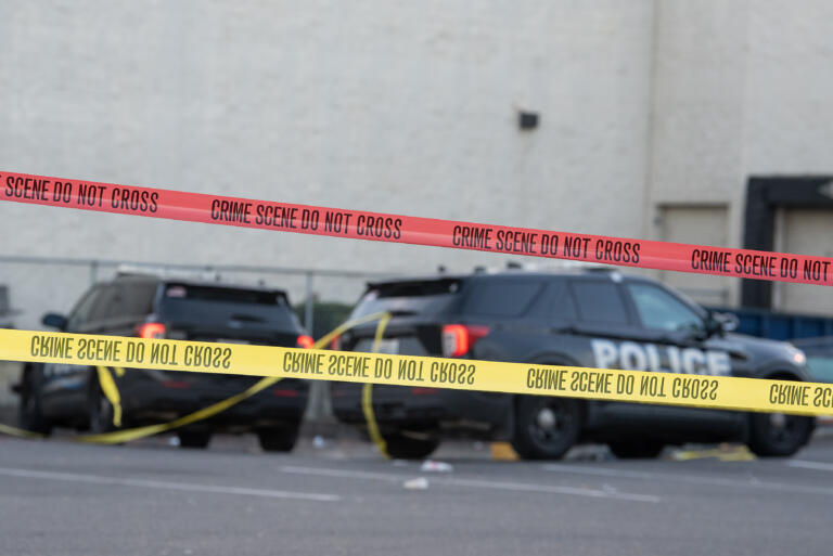 Law enforcement officers investigate a shooting at the Cascade Park Safeway store on Thursday morning, Dec. 5, 2024. Vancouver police shot and killed a man Wednesday night after he physically attacked a police officer, according to a statement from the agency. (Amanda Cowan/The Columbian)