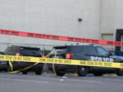 Law enforcement officers investigate a shooting at the Cascade Park Safeway store on Thursday morning, Dec. 5, 2024. Vancouver police shot and killed a man Wednesday night after he physically attacked a police officer, according to a statement from the agency.