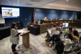 Ridgefield High School Principal Christen Palmer, left, speaks during Tuesday&rsquo;s school board meeting at Ridgefield Administration and Civic Center. During the meeting, the school board voted to place two levies on February&rsquo;s ballot.