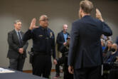 Chief Troy Price, second from left, is sworn in as Vancouver&rsquo;s next police chief Monday afternoon at Vancouver City Hall. Price has been with the Vancouver Police Department since 1997 and worked his way up the ranks from patrol officer.