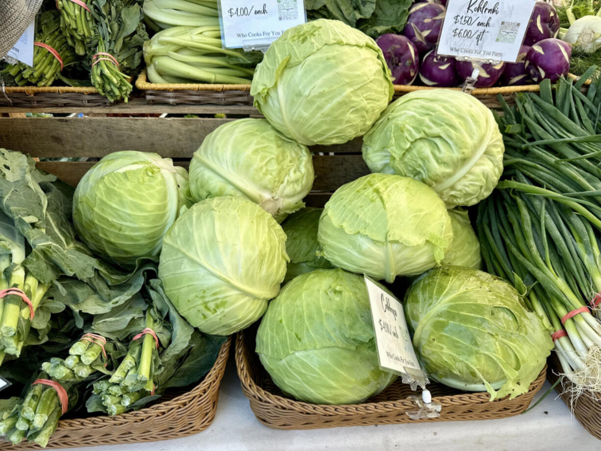 Green cabbage on display at the Bloomfield Saturday Market in October 2024. (Hal B.