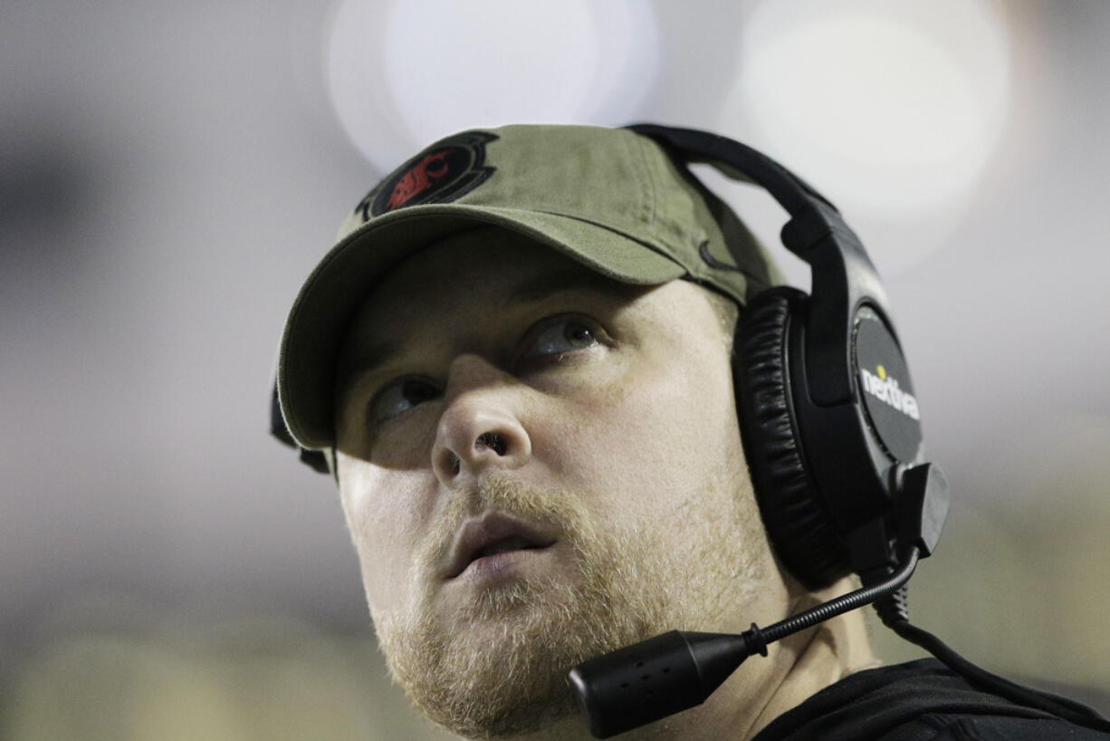 Washington State offensive coordinator Ben Arbuckle stands on the sideline during the second half of an NCAA college football game against Colorado, Friday, Nov. 17, 2023, in Pullman, Wash.