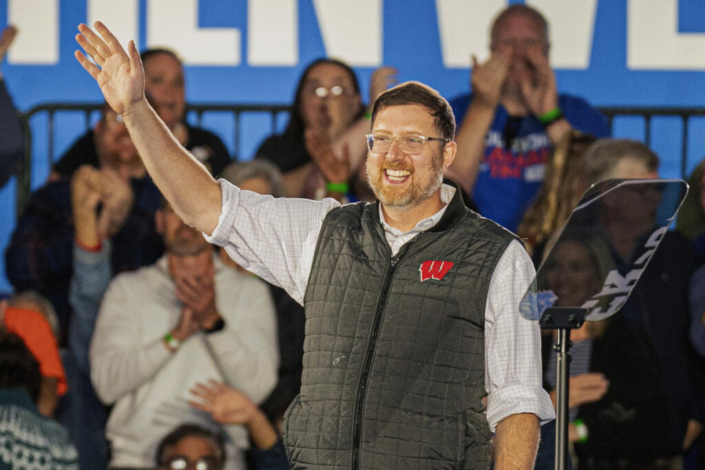 FILE - Ben Wikler, chair of the Democratic Party of Wisconsin, waves to the crowd at a campaign event, Nov. 1, 2024, in Little Chute, Wis.