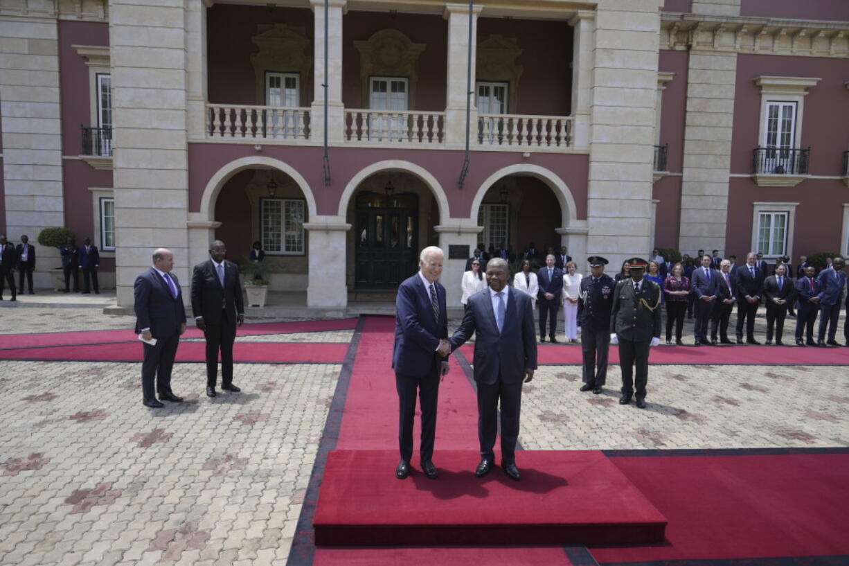 President Joe Biden shakes hand with Angola&rsquo;s President Joao Lourenco, at the presidential palace in the capital Luanda, Angola on Tuesday, Dec. 3, 2024.