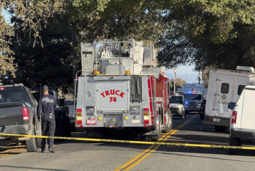 Emergency personnel state outside the Feather River Adventist School after a shooting Wednesday, Dec. 4, 2024, in Oroville, Calif.