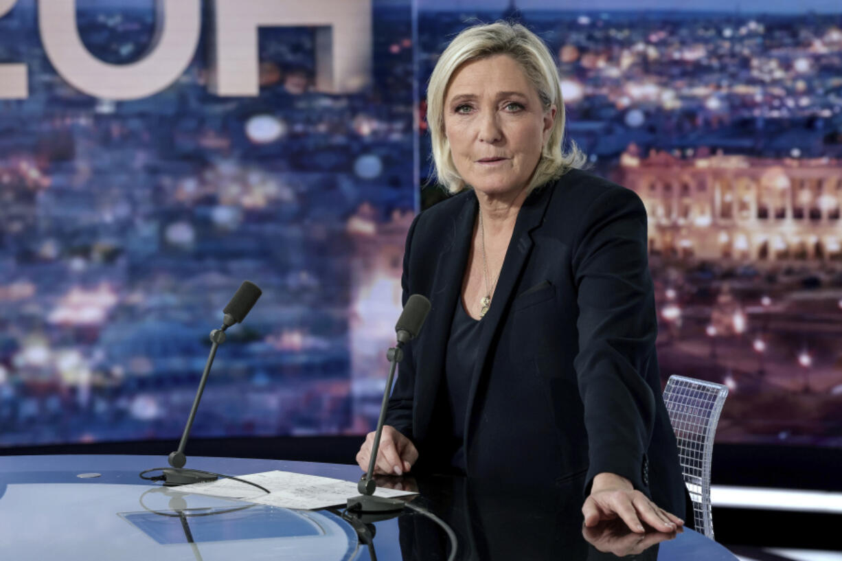 French far-right leader Marine Le Pen poses prior to an interview on French TV channel TF1, in Boulogne-Billancourt, outside Paris, Wednesday, Dec. 4, 2024 after France&#039;s far-right and left-wing lawmakers joined together to vote a no-confidence motion prompted by budget disputes that forces Prime Minister Michel Barnier to resign.