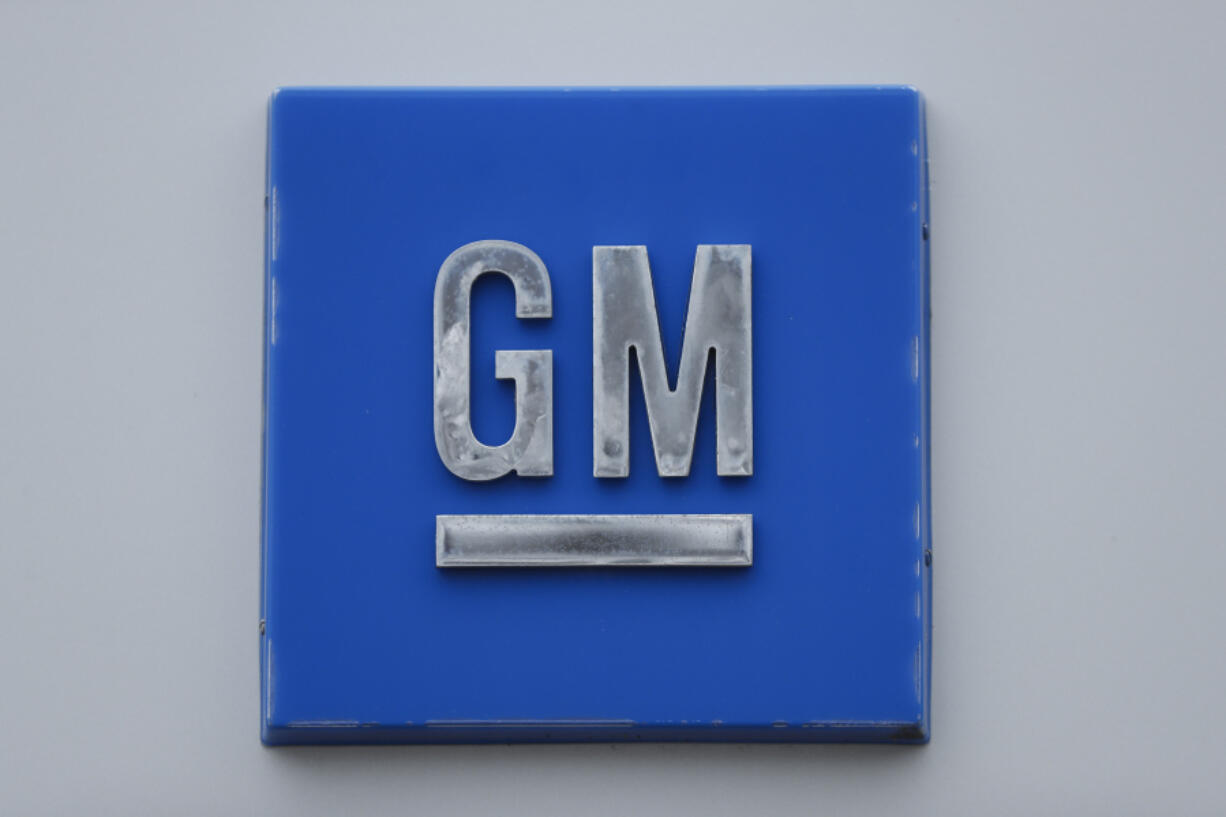 FILE - A GM logo is shown at the General Motors Detroit-Hamtramck Assembly plant in Hamtramck, Mich., Jan. 27, 2020.