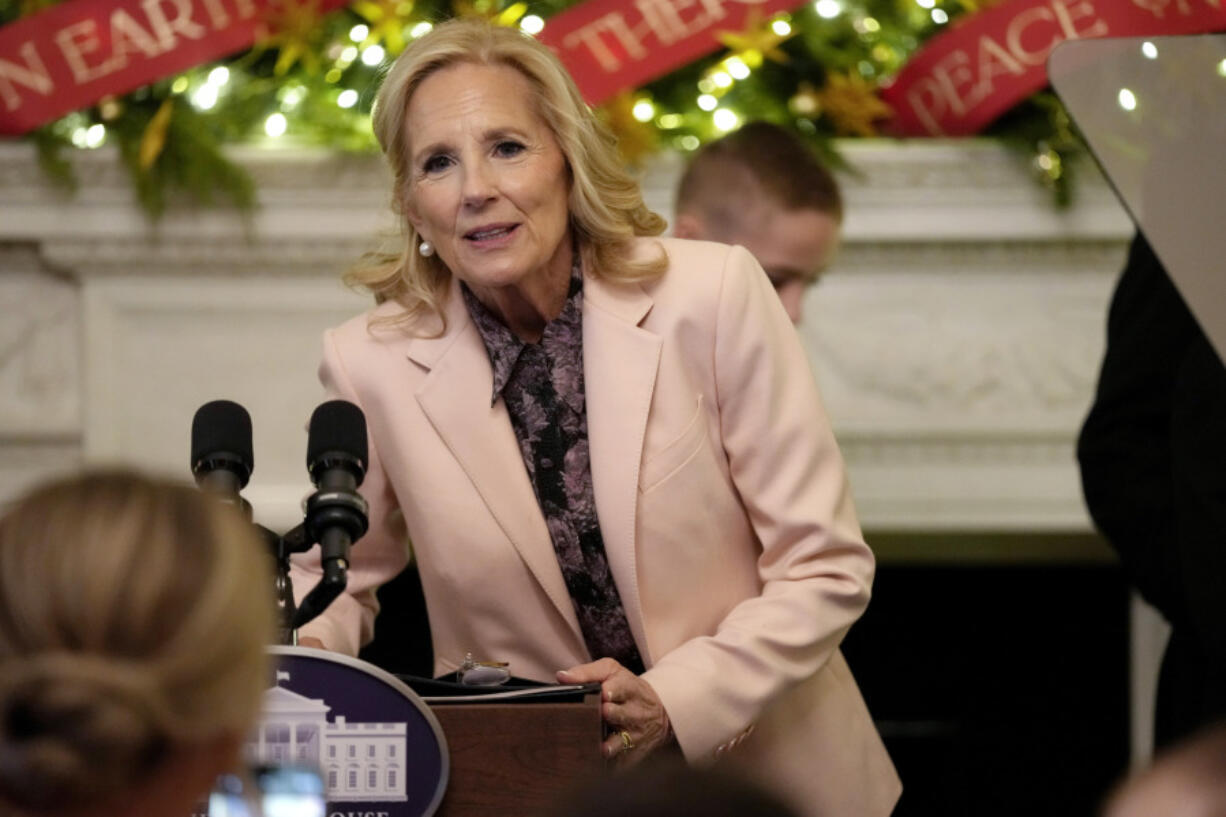 FILE - First lady Jill Biden comments on the pardon of Hunter Biden following an event with military families in the State Dining Room of the White House in Washington, Dec. 2, 2024. Jill Biden is departing Tuesday on her final solo foreign trip as first lady. It&#039;s a six-day, four-country haul through Italy, the United Arab Emirates, Qatar and France. It ends with her and President-elect Donald Trump joining other dignitaries in Paris on Saturday for the reopening of Notre Dame cathedral.