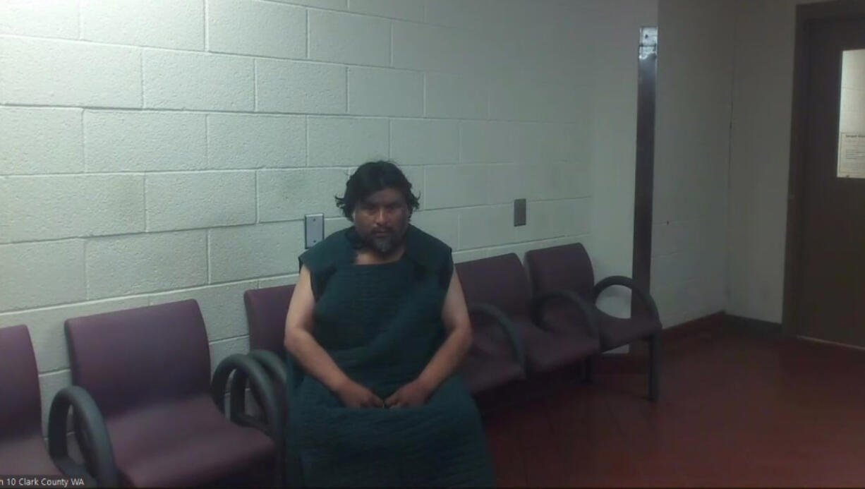 Guadalupe V. Munoz, 44, appears in May in Clark County Superior Court on suspicion of vehicular homicide, vehicular assault and driving under the influence. He struck a fire truck that had responded to a prior crash and then struck two pedestrians who had stopped to help, killing one and injuring the other. He was sentenced Tuesday to about 12 years in prison.