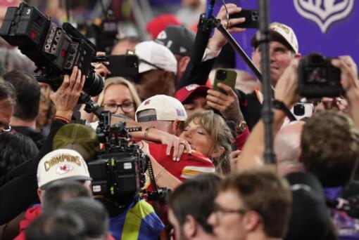 Taylor Swift embraces Kansas City Chiefs tight end Travis Kelce after the NFL Super Bowl 58 football game against the San Francisco 49ers, on Feb. 11, 2024, in Las Vegas. The Chiefs won 25-22 against the 49ers.