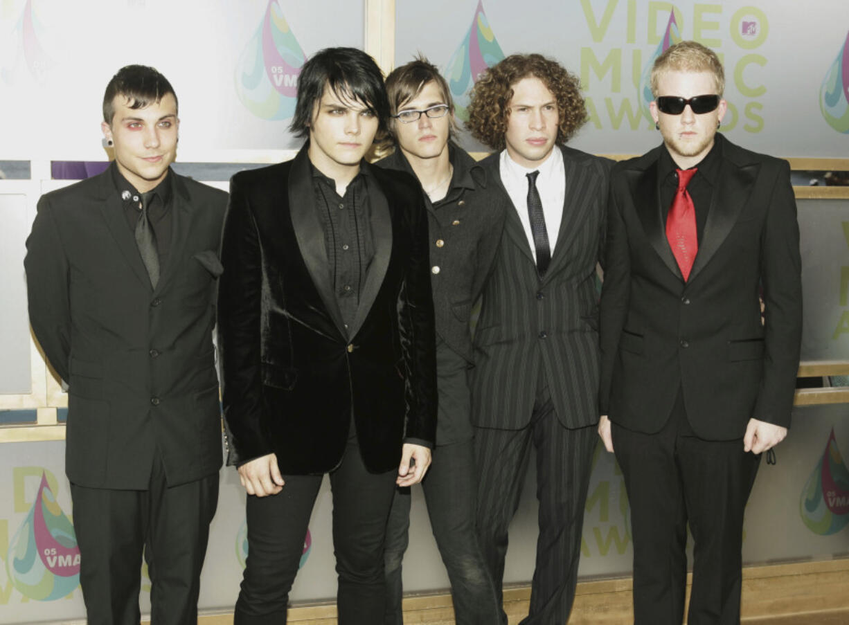 FILE - Members of My Chemical Romance pose for photographers as they arrive on the white carpet of the 2005 MTV Video Music Awards, Aug. 28, 2005 at the American Airlines Arena in Miami, Fla.