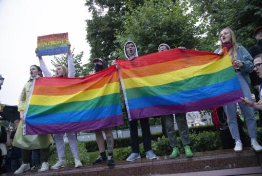 FILE &ndash; LGBTQ+ activists wave flags at a rally in Moscow on July 15, 2020.