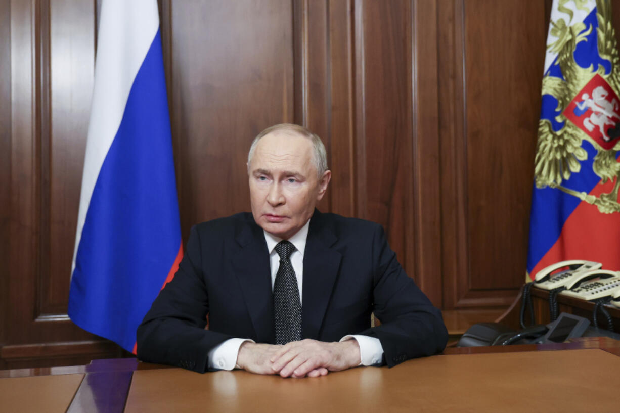 FILE - Russian President Vladimir Putin addressees the nation from the Kremlin in Moscow, Russia, on Nov. 21, 2024, about the use of a new hypersonic missile in Ukraine.