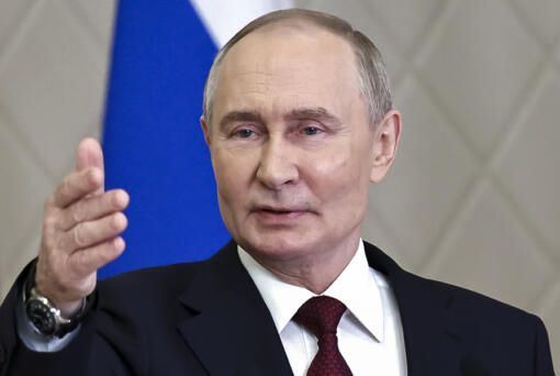 FILE - Russian President Vladimir Putin gestures while speaking to the media after the summit of the Collective Security Treaty Organization in Astana, Kazakhstan, Nov. 28, 2024.