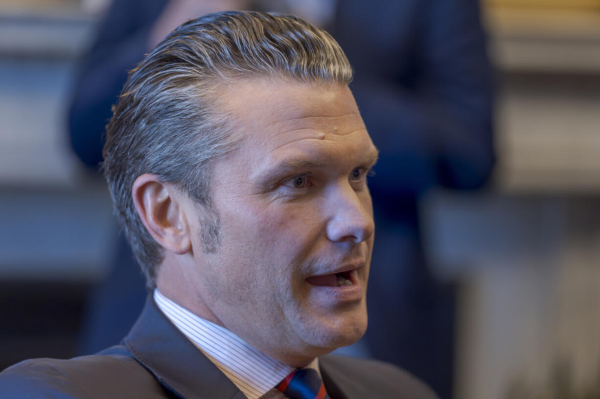 Pete Hegseth, President-elect Donald Trump&rsquo;s nominee to be defense secretary, meets with Sen. Tommy Tuberville R-Ala., a member of the Senate Armed Services Committee, at the Capitol in Washington, Monday, Dec. 2, 2024. (AP Photo/J.