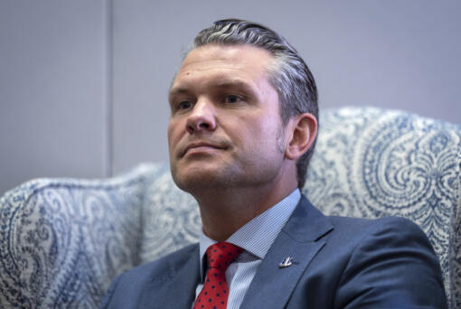 Pete Hegseth, President-elect Donald Trump&rsquo;s nominee to be defense secretary, responds to reporters during a meeting with Sen. Mike Rounds, R-S.D., a member of the Senate Armed Services Committee, at the Capitol in Washington, Thursday, Dec. 5, 2024. (AP Photo/J.