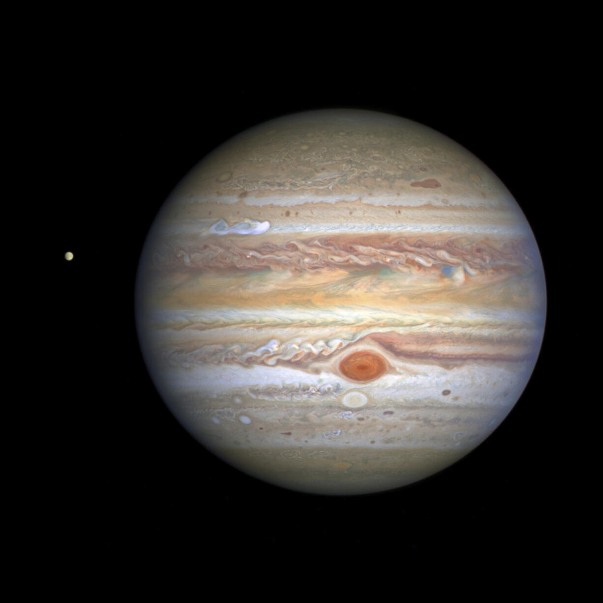 NASA
This Aug. 25, 2020 image captured by NASA&rsquo;s Hubble Space Telescope shows the planet Jupiter and one of its moons, Europa, at left, when the planet was 406 million miles from Earth. (, ESA, STScI, A. Simon, M. via AP)