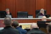 Clark County Councilors Gary Medvigy, facing left, and Sue Marshall listen during a meeting at the Public Service Center in October. The council voted 3-2 on Wednesday to approve a $871.74 million budget for 2025.